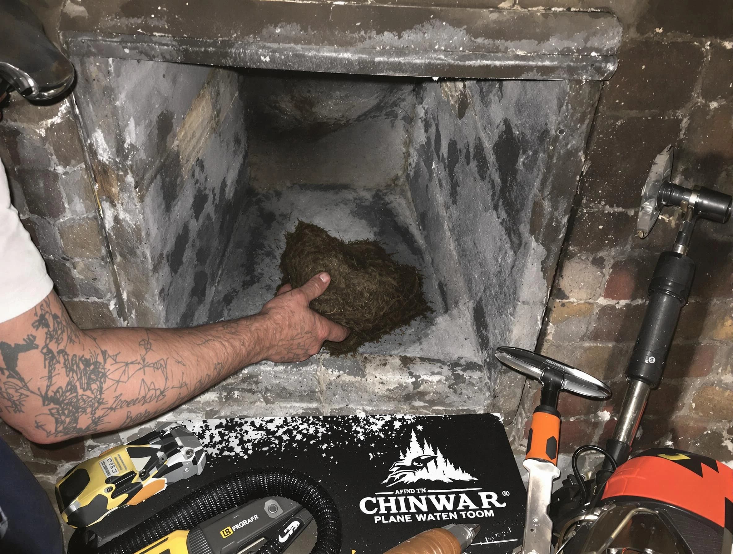 Stansbury Park Chimney Sweep safely removing debris and screening chimney in Stansbury Park, UT